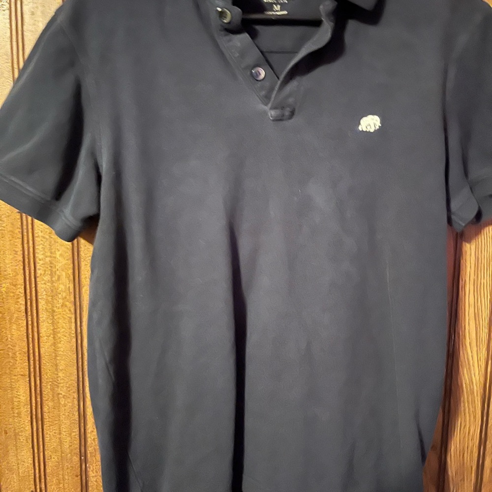 Navy blue Banana Republic polo style shirt size medium, used & in good condition